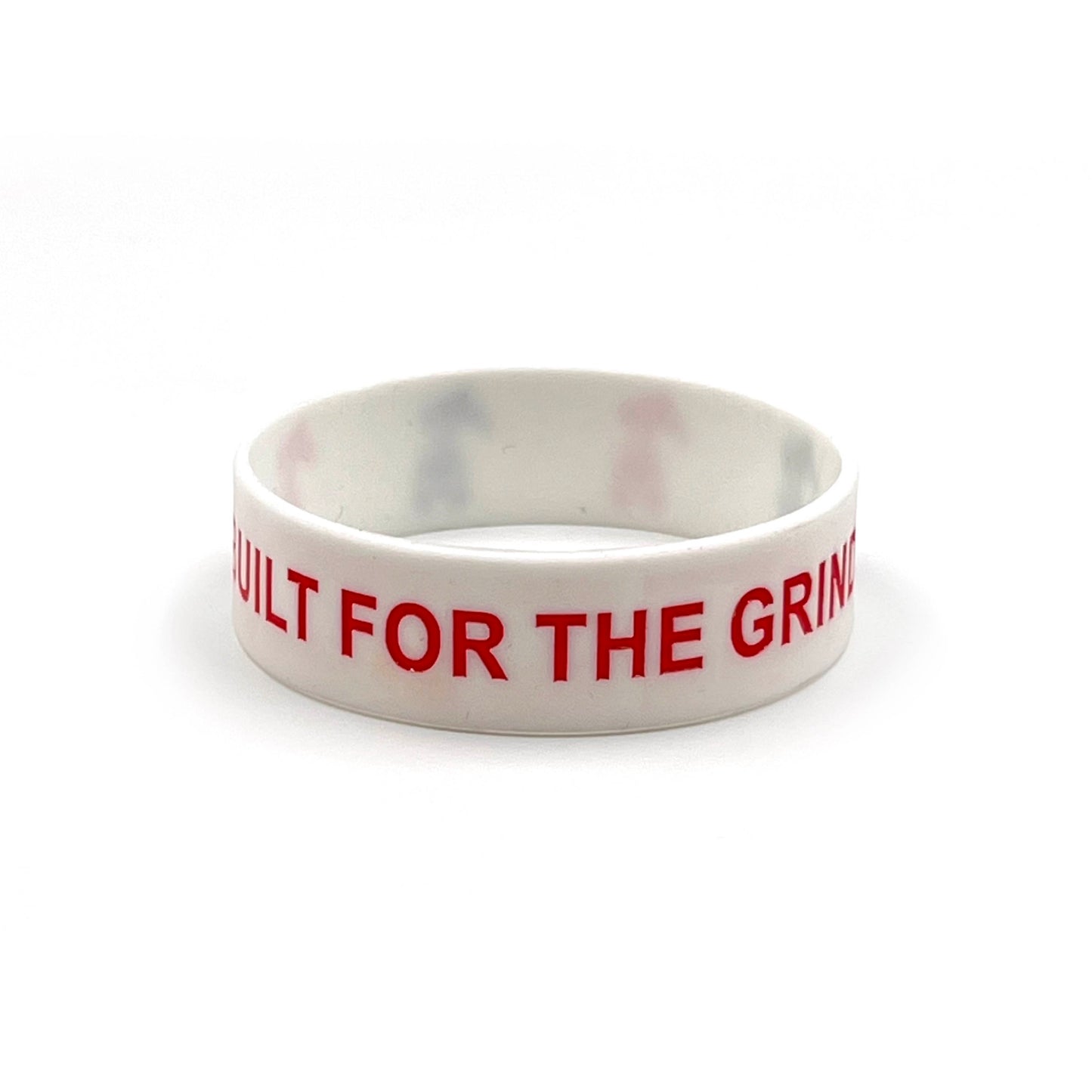 White wristband with red and black logo.  Also has Built For The Grind spelled out.